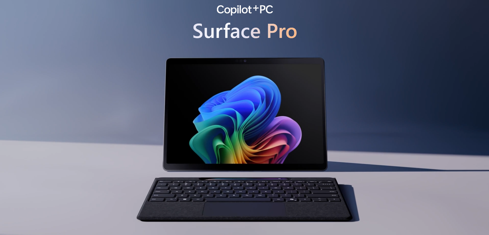 Photo by Capitalist Money on June 16, 2024. May be an image of The image shows a Microsoft Surface Pro tablet with a keyboard attached to it. The tablet is displaying a colorful abstract background, and the keyboard is black with a large trackpad. The image may contain text such as 'Copilot+PC', 'Surface Pro'.