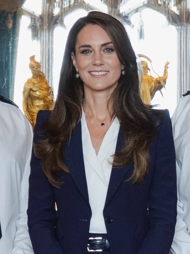 Photo by Capitalist Money on June 05, 2024. May be an image of Catherine, Princess of Wales smiling in a blue blazer and white top .