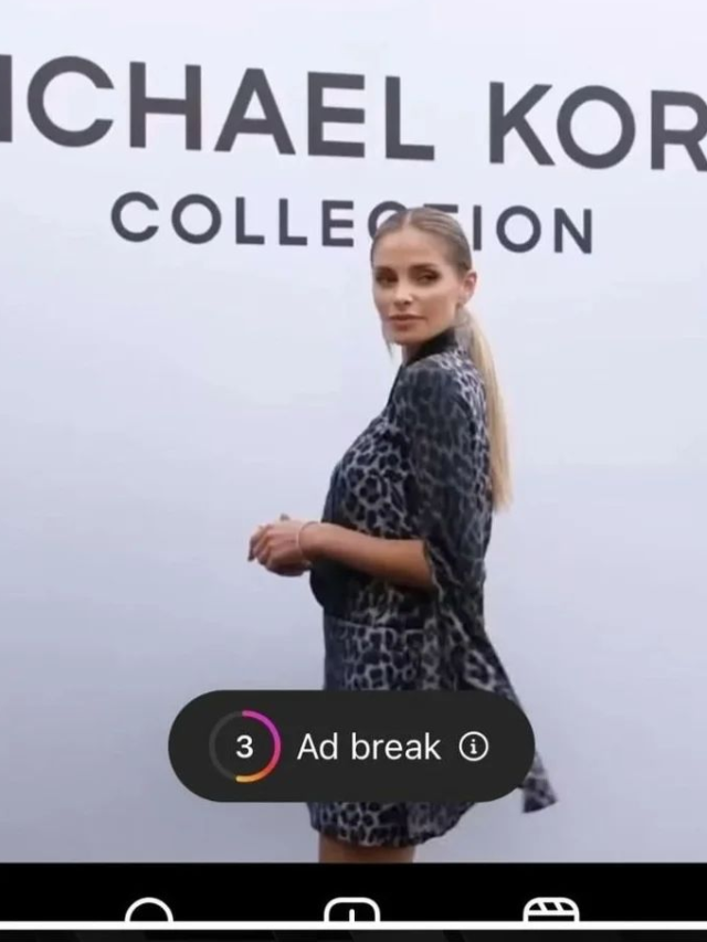 Photo by Capitalist Money on June 04, 2024. May be an image of A woman in a leopard print outfit is posing in front of a Michael Kors wall. The image may contain text such as 'MICHAEL KORS COLLECTION', '3 Ad break'.