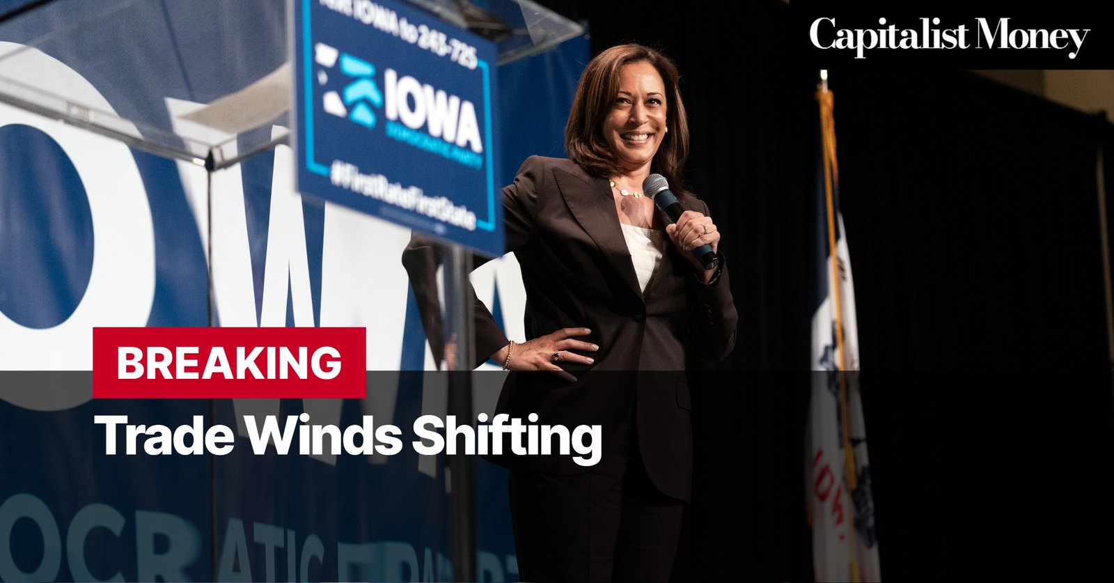 Photo by Capitalist Money on August 13, 2024. May be an image of Kamala Harris speaking at an event in Iowa with the text "Trade Winds Shifting" overlaid on the image. The image may contain text such as 'IOWA', '#FirstInTheNation', 'Capitalist Money', 'BREAKING', 'Trade Winds Shifting'.