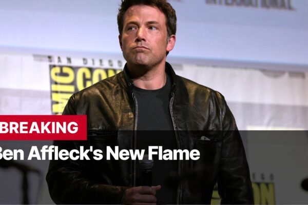 Photo by Capitalist Money on August 26, 2024. May be an image of Ben Affleck is pictured in a black leather jacket, looking serious. The background suggests he's at an event, possibly Comic-Con. The image may contain text such as 'BREAKING', 'Ben Affleck's New Flame'.