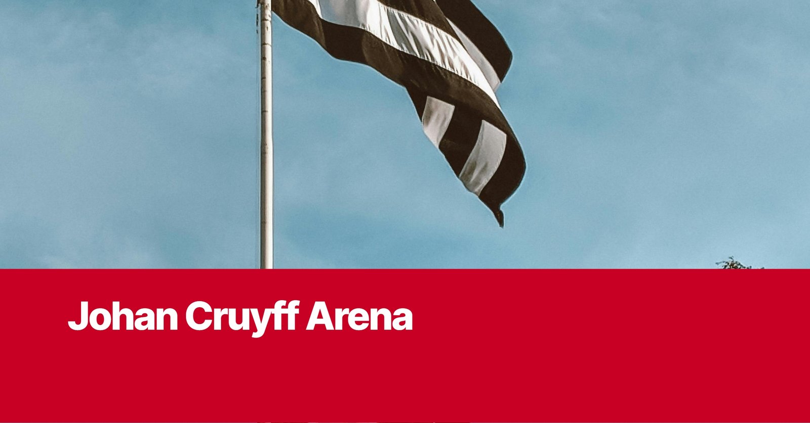 Photo by Capitalist Money on September 11, 2024. May be an image of A black and white flag with the Johan Cruyff Arena logo on a red background flies in the breeze against a bright blue sky. The image may contain text such as 'J', 'o', 'h', 'a', 'n', ' ', 'C', 'r', 'u', 'y', 'f', 'f', ' ', 'A', 'r', 'e', 'n', 'a'.