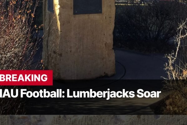 Photo by Capitalist Money on September 08, 2024. May be an image of A close-up photo of a stone monument with the words "NAU Football: Lumberjacks Soar" written across the bottom. The image may contain text such as 'BREAKING', 'NAU Football: Lumberjacks Soar'.