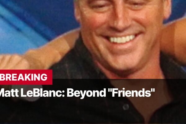 Photo by Capitalist Money on September 08, 2024. May be an image of Matt LeBlanc, known for his role as Joey Tribbiani on the hit sitcom "Friends," is seen here smiling and looking happy. He is in a dark shirt and appears to be surrounded by people. The image may contain text such as 'BREAKING', 'Matt LeBlanc: Beyond "Friends"'.