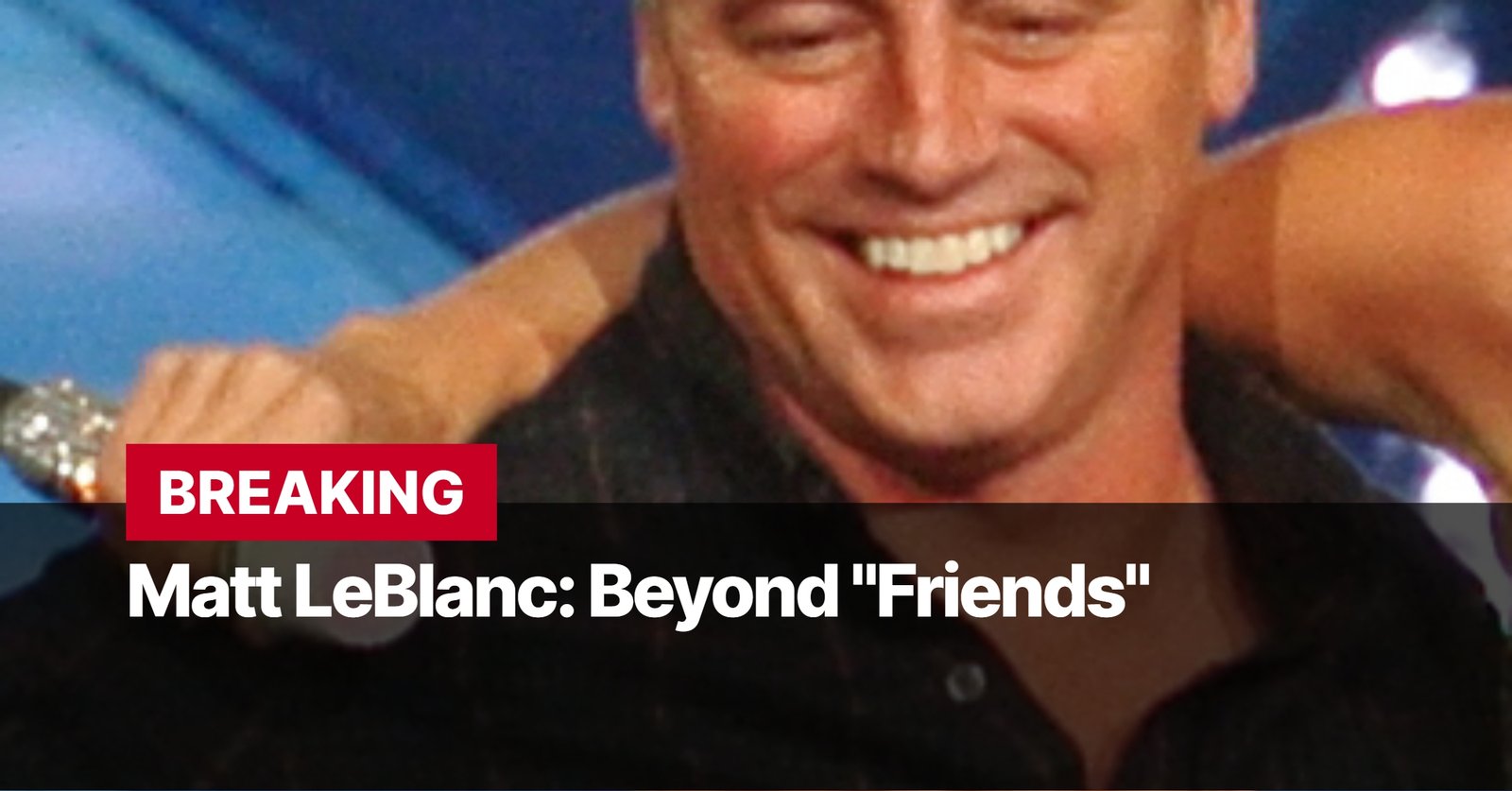 Photo by Capitalist Money on September 08, 2024. May be an image of Matt LeBlanc, known for his role as Joey Tribbiani on the hit sitcom "Friends," is seen here smiling and looking happy. He is in a dark shirt and appears to be surrounded by people. The image may contain text such as 'BREAKING', 'Matt LeBlanc: Beyond "Friends"'.