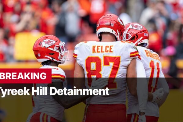 Photo by Capitalist Money on September 09, 2024. May be an image of Kansas City Chiefs players Travis Kelce and JuJu Smith-Schuster huddle together on the sidelines during a game. The image may contain text such as 'BREAKING Tyreek Hill Detainment'.