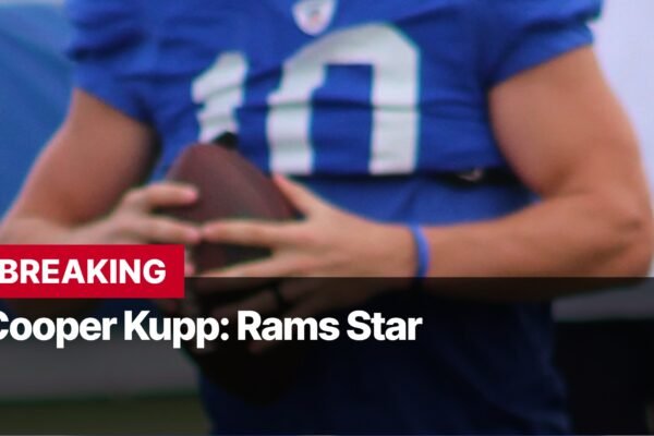 Photo by Capitalist Money on September 09, 2024. May be an image of A blurry image of a football player holding a football in his hands. The image may contain text such as 'BREAKING', 'Cooper Kupp: Rams Star'.