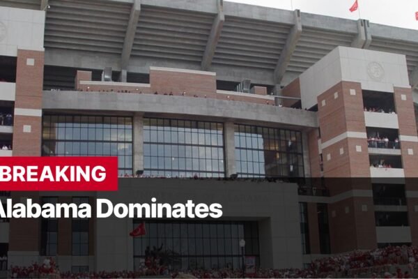 Photo by Capitalist Money on September 08, 2024. May be an image of The image shows the exterior of a large stadium, with the words "BREAKING: Alabama Dominates" in bold, red letters. There are people in the stands, and the stadium is decorated with the team's colors. The image may contain text such as 'BREAKING', 'Alabama Dominates'.