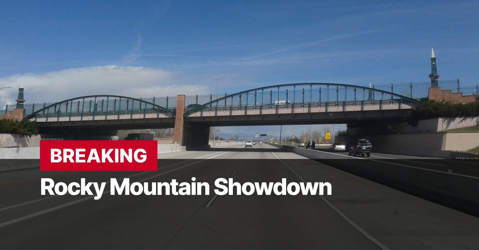 Photo by Capitalist Money on September 15, 2024. May be an image of A photo showing a freeway bridge with a sign that reads "Breaking Rocky Mountain Showdown." The image may contain text such as 'BREAKING', 'Rocky Mountain Showdown'.