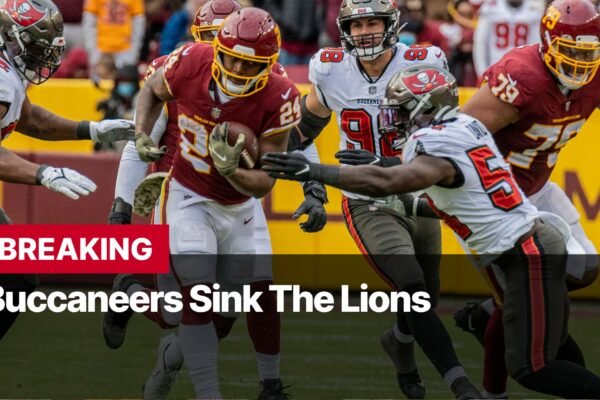 Photo by Capitalist Money on September 16, 2024. May be an image of The Tampa Bay Buccaneers are celebrating a victory over the Detroit Lions as a player runs with the ball. The image may contain text such as 'BREAKING', 'Buccaneers Sink The Lions'.