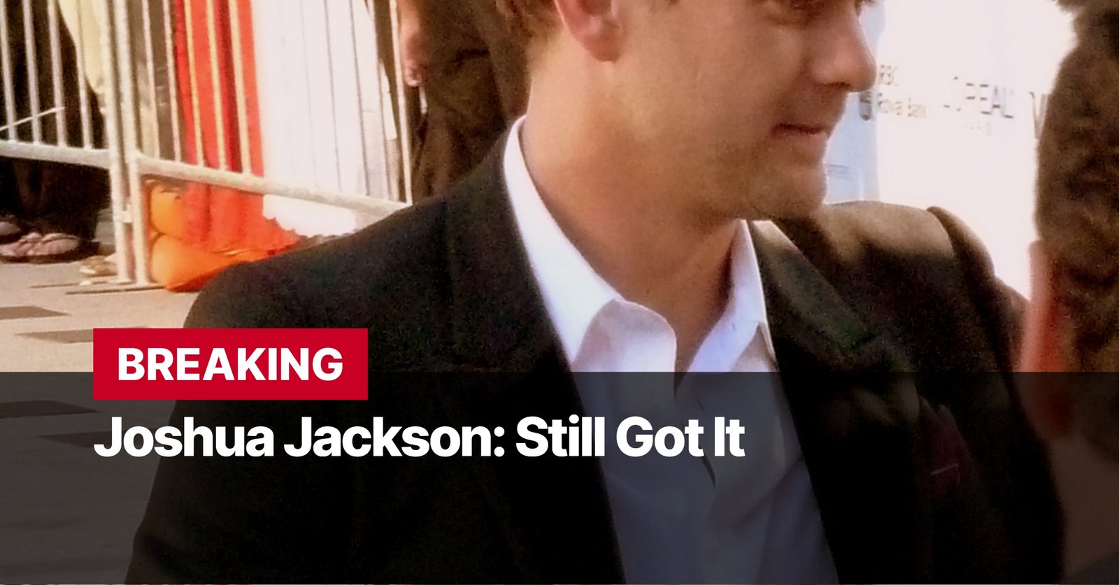 Photo by Capitalist Money on September 16, 2024. May be an image of A man wearing a white shirt under a black jacket is walking in a crowded place. The words 'BREAKING' and 'Joshua Jackson: Still Got It' are printed in bold white letters on a red rectangle over a black background. The image may contain text such as 'BREAKING', 'Joshua Jackson: Still Got It'.