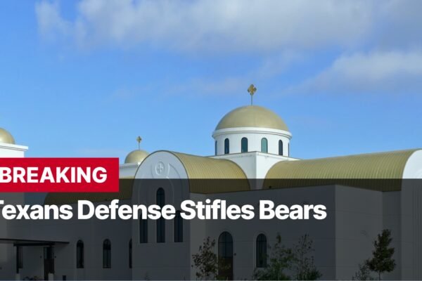 Photo by Capitalist Money on September 17, 2024. May be an image of The image shows a building with golden domes and a sign that says "BREAKING Texans Defense Stifles Bears." The image may contain text such as 'BREAKING', 'Texans Defense Stifles Bears'.