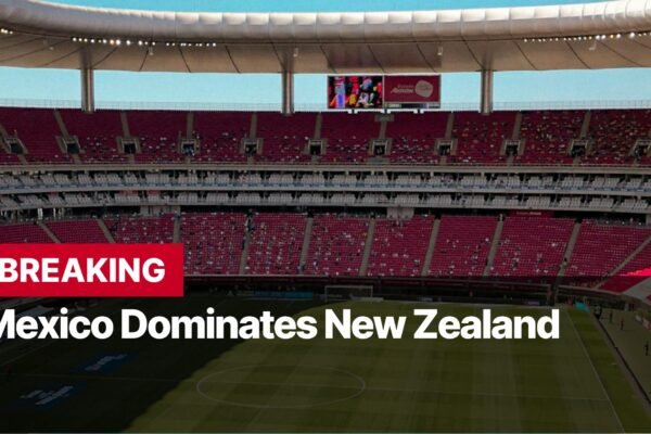 Photo by Capitalist Money on September 08, 2024. May be an image of An image of a large, mostly full soccer stadium, looking down from the upper concourse at a game in progress. The field is green and the stands are red. The image may contain text such as 'BREAKING Mexico Dominates New Zealand'.