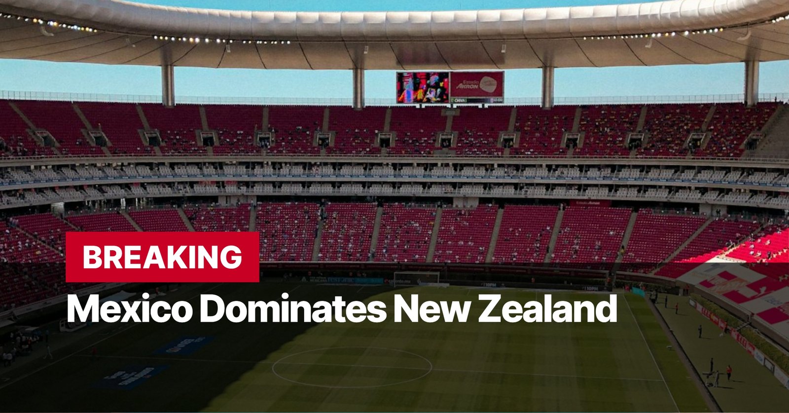 Photo by Capitalist Money on September 08, 2024. May be an image of An image of a large, mostly full soccer stadium, looking down from the upper concourse at a game in progress. The field is green and the stands are red. The image may contain text such as 'BREAKING Mexico Dominates New Zealand'.