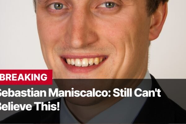 Photo by Capitalist Money on September 18, 2024. May be an image of A close-up of a man's face. He is smiling and his teeth are visible. He is wearing a suit and tie. The text 'BREAKING Sebastian Maniscalco: Still Can't Believe This!' is in the lower part of the image. The image may contain text such as 'BREAKING', 'Sebastian Maniscalco: Still Can't Believe This!'.