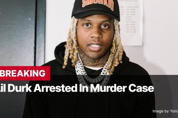 Photo by Capitalist Money on October 30, 2024. May be an image of A man wearing a black hoodie, a black baseball cap, and a thick gold chain necklace. The text "BREAKING Lil Durk Arrested In Murder Case" is at the bottom of the image. The image may contain text such as 'BREAKING', 'Lil Durk Arrested In Murder Case', 'Image by YolsThatJordan'.