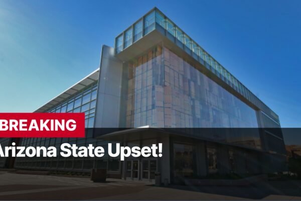 Photo by Capitalist Money on October 12, 2024. May be an image of A modern glass and metal building with a black awning and the text "BREAKING Arizona State Upset!" on the front. The image may contain text such as 'B', 'R', 'E', 'A', 'K', 'I', 'N', 'G', ' ', 'A', 'r', 'i', 'z', 'o', 'n', 'a', ' ', 'S', 't', 'a', 't', 'e', ' ', 'U', 'p', 's', 'e', 't', '!'.