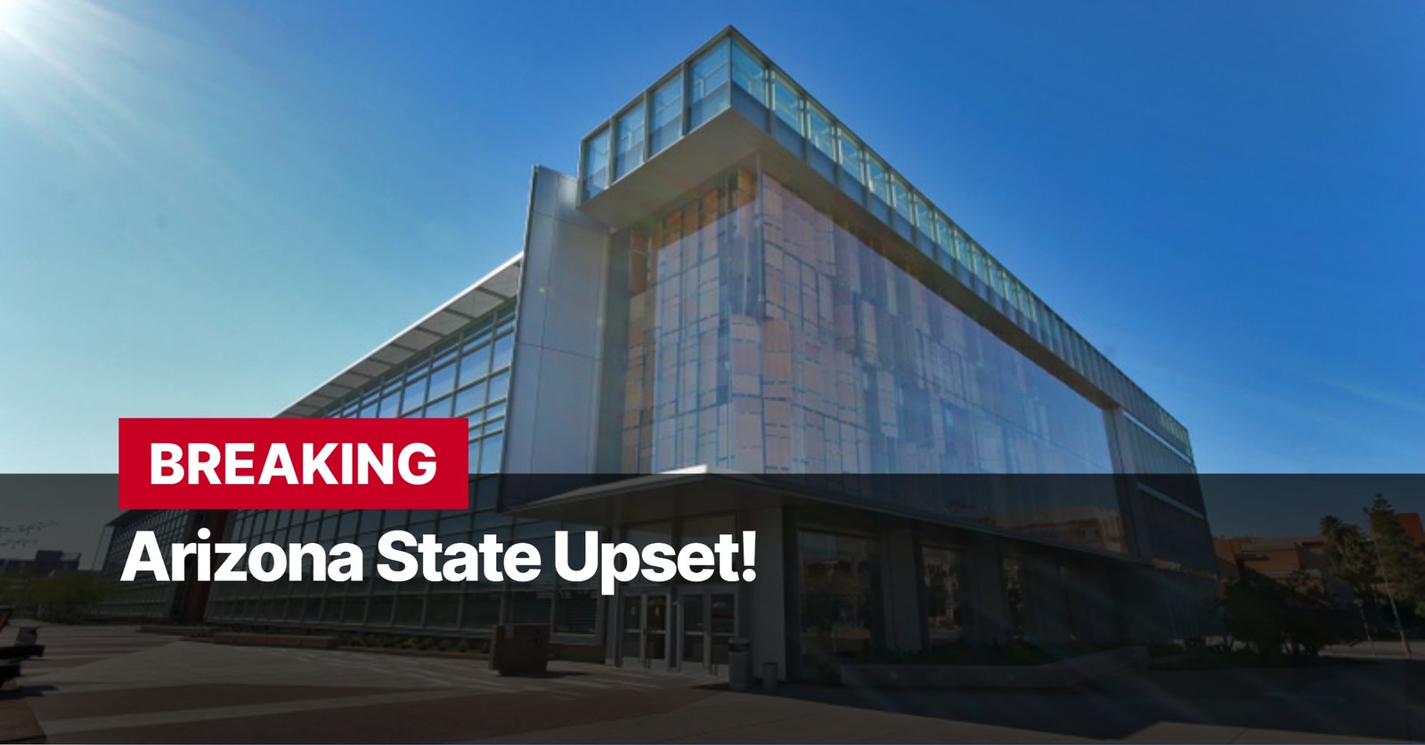 Photo by Capitalist Money on October 12, 2024. May be an image of A modern glass and metal building with a black awning and the text "BREAKING Arizona State Upset!" on the front. The image may contain text such as 'B', 'R', 'E', 'A', 'K', 'I', 'N', 'G', ' ', 'A', 'r', 'i', 'z', 'o', 'n', 'a', ' ', 'S', 't', 'a', 't', 'e', ' ', 'U', 'p', 's', 'e', 't', '!'.