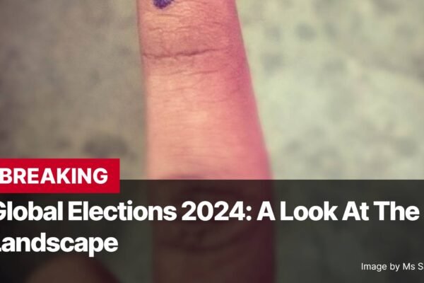 Photo by Capitalist Money on November 04, 2024. May be an image of A close-up of a finger with a purple mark on it, likely from voting, with the text 'BREAKING' in red above it. Below the finger is a title that reads 'Global Elections 2024: A Look At The Landscape.' The image may contain text such as 'BREAKING', 'Global Elections 2024: A Look At The Landscape', 'Image by Ms Sarah Welch'.