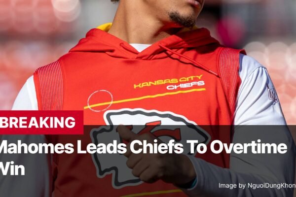 Photo by Capitalist Money on November 05, 2024. May be an image of A photo of Patrick Mahomes, quarterback for the Kansas City Chiefs, with his arm raised in a victory pose. He is wearing a red Chiefs jersey and a white undershirt. He has a determined look on his face. The background is a red brick wall, suggestive of a stadium. The image may contain text such as 'BREAKING Mahomes Leads Chiefs To Overtime Win Image by NguoiDungKhongDinhDanh', 'KANSAS CITY CHIEFS', 'FOOTBALL CONFERENCE WEST - AMERICAN FOOTBALL CONFERENCE WEST - AMERICAN FOOTBALL C'.