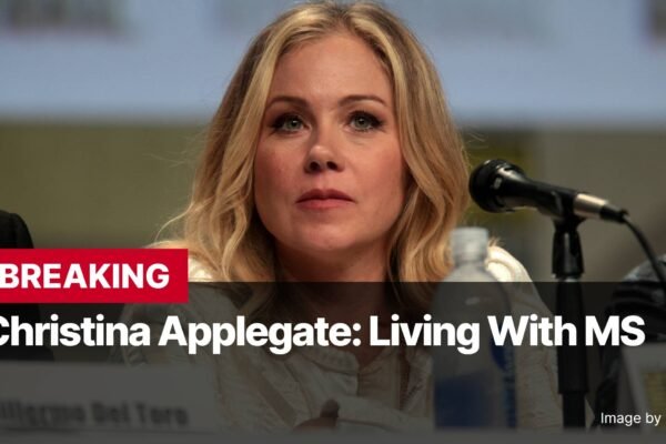 Photo by Capitalist Money on November 07, 2024. May be an image of Christina Applegate, a well-known actress, looks pensive as she speaks into a microphone. This image was taken during a recent event where Applegate opened up about her struggle with Multiple Sclerosis. She is a role model for many and continues to inspire fans with her resilience. The image may contain text such as 'BREAKING', 'Christina Applegate: Living With MS', 'Image by Lady Lotus'.