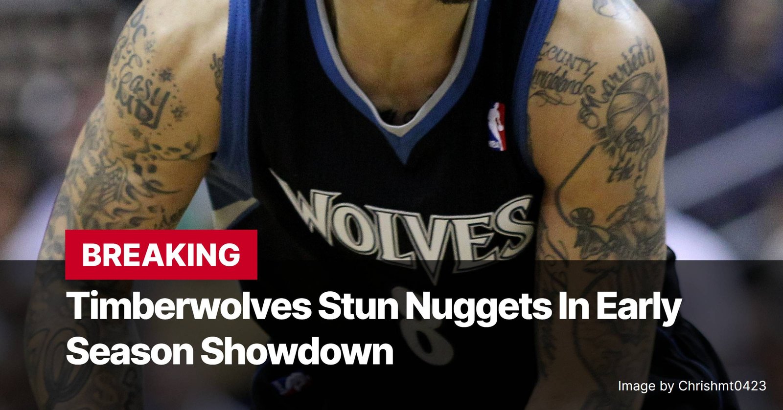 Photo by Capitalist Money on November 02, 2024. May be an image of A Minnesota Timberwolves player wears a black and blue jersey with the word "WOLVES" across the front. The player has several tattoos on his left arm. The image may contain text such as 'BREAKING', 'Timberwolves Stun Nuggets In Early Season Showdown', 'Image by Chrismmt0423'.