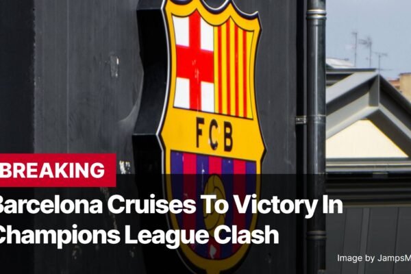 Photo by Capitalist Money on November 07, 2024. May be an image of The FC Barcelona crest is displayed on a black wall, with a "BREAKING" banner and the text "Barcelona Cruises To Victory In Champions League Clash" below. The image is likely a news report about a recent football match. The image may contain text such as 'BREAKING', 'Barcelona Cruises To Victory In', 'Champions League Clash', 'Image by JampsMediaHouse', 'FCB'.