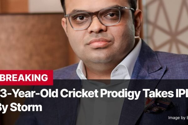 Photo by Capitalist Money on November 26, 2024. May be an image of Close-up of a man wearing glasses and a suit jacket. The background is blurred. The image may contain text such as 'BREAKING', '13-Year-Old Cricket Prodigy Takes IPL', 'By Storm', 'Image by B4bhavisha'.