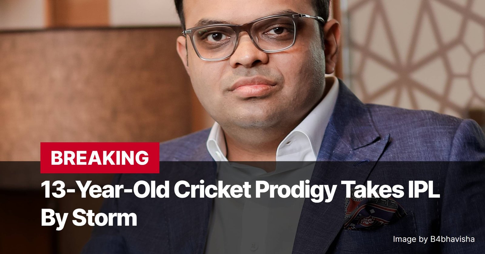 Photo by Capitalist Money on November 26, 2024. May be an image of Close-up of a man wearing glasses and a suit jacket. The background is blurred. The image may contain text such as 'BREAKING', '13-Year-Old Cricket Prodigy Takes IPL', 'By Storm', 'Image by B4bhavisha'.