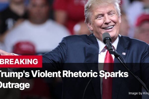 Photo by Capitalist Money on November 02, 2024. May be an image of A man in a suit smiles and points to the right while speaking into a microphone at a rally. The image may contain text such as 'BREAKING Trump's Violent Rhetoric Sparks Outrage Image by Kingofthedead'.