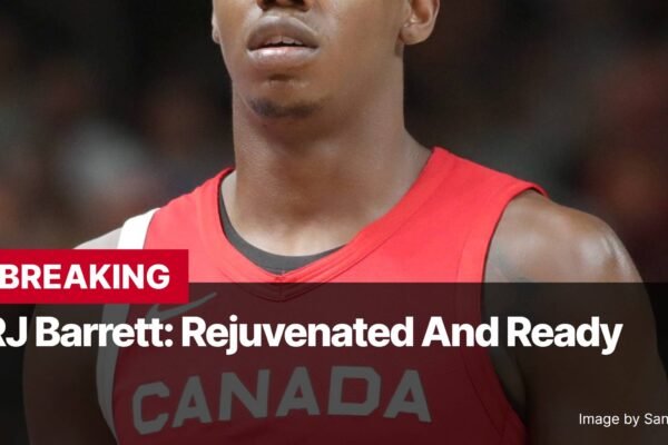 Photo by Capitalist Money on November 02, 2024. May be an image of A close-up photo of RJ Barrett, a professional basketball player, wearing a Canadian jersey and looking determined. The image may contain text such as 'BREAKING', 'RJ Barrett: Rejuvenated And Ready', 'CANADA', 'Image by Sandro Halank'.