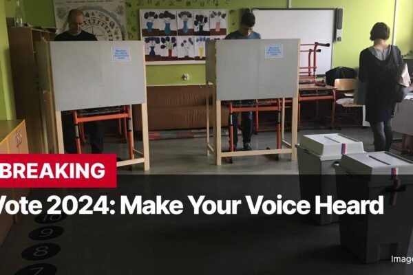 Photo by Capitalist Money on November 03, 2024. May be an image of The image shows a voting booth in a school setting. People are casting their votes in private booths. There are ballot boxes in the foreground. The image may contain text such as 'BREAKING Vote 2024: Make Your Voice Heard Image by Frettie'.